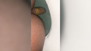 Amateur black girl shitting in the toilet