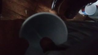 Guy pissing in the coffee mug