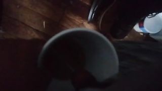 Guy pissing in the coffee mug