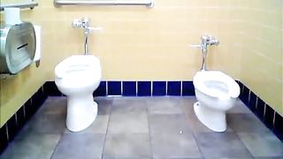 Preggo lady takes a leak in the toilet
