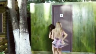 Two hot girls have diarrhea in an outhouse and get stink bombed by friends