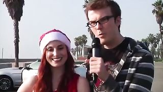 Sexy santa pretends to shit herself in public