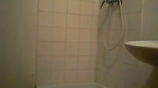 Hot babe pissing in the shower