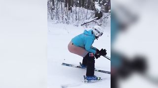 Ski pooping chick in the snow