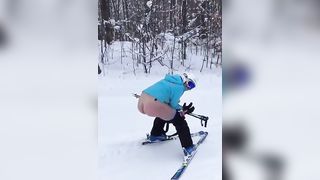 Ski pooping chick in the snow