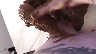 Tattooed chick loves cock and poop
