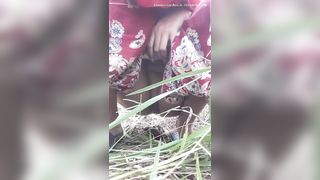 Busty Thai lady pooping in the forest