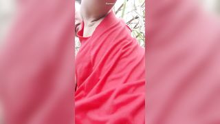 Busty Thai lady pooping in the forest