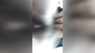 Hairy Thai chick pooping in closeup