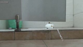 Voyeur woman poops in the floor in a Chinese toilet