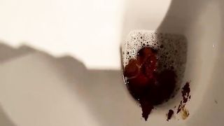 Hot chick spread her ass cheeks and poop