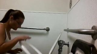 Mature pooping in public bathroom