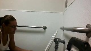 Mature pooping in public bathroom