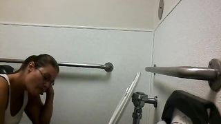 Mature pooping in public bathroom