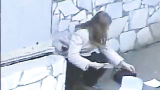 Curvy redhead Japanese chick caught pooping in the corner