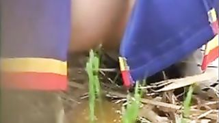 Amateur babe caught taking load outdoor