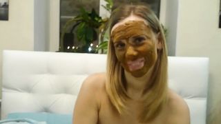 Blonde babe smears poop on her entire face