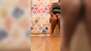 Ebony shitting in bathroom's floor