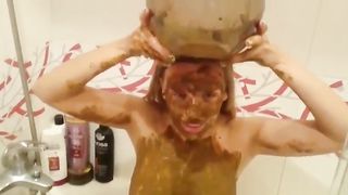 Scat slut taking bath from huge shit bucket