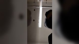 Amateur chick in mask pooping in the toilet
