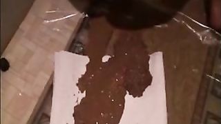 Mature woman shitting diarrhea on the floor