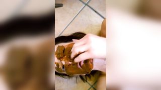 Girl lays in a pile of her own shit