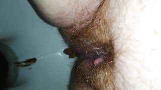 Chubby hairy milf pooping in toilet