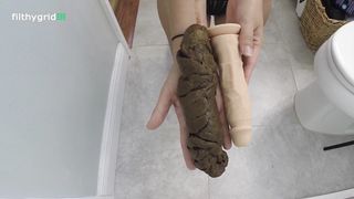 Scat wife showing her huge turd dildo
