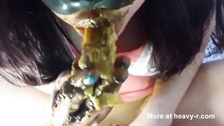 Brunette babe pooping and smearing shit