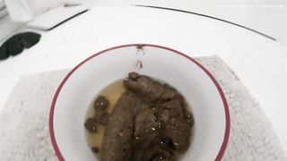 Lady is enjoying fresh turd meal