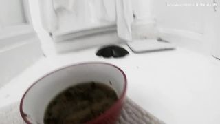 Lady is enjoying fresh turd meal