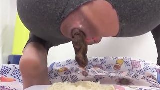 Scat fetish babe pooping in the rice plate