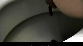 Skinny babe pooping in the closeup