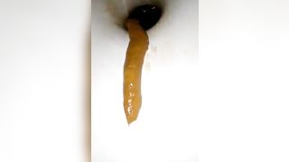 Deep closeup of pooping asshole