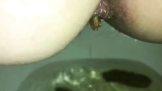 Ugly hairy ass taking out green turd