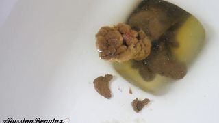 Beautiful brunette chick pooping