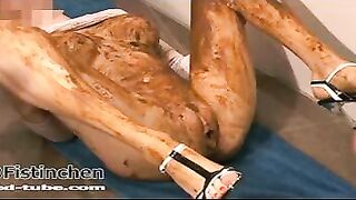 Busty lady gets covered in shit
