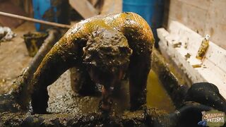 Naughty girl playing in manure basin