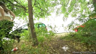 Girl showing her ass while pooping in the bushes