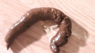 Hairy Mom Produces Long Hard Turd
