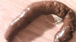 Hairy Mom Produces Long Hard Turd