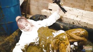 I'm covered in cow shit for a health cure