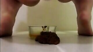 Mature hairy woman pissing and shitting