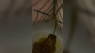 Girl shits on the floor and spreads it around