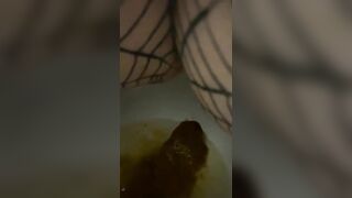 Girl shits on the floor and spreads it around