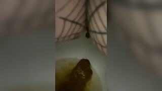 Girl shits on the floor and spreads it around