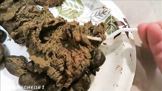 Pretty brunette girl eating shit