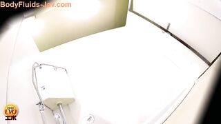 Cute looking Japanese teen in brown skin boots spy poop show