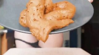Sexy lady poops heavily before smearing it