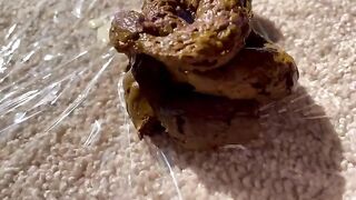 Girl takes a shit on a table and plays with it